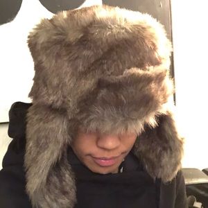 Furry Winter fashion hat with earflaps.